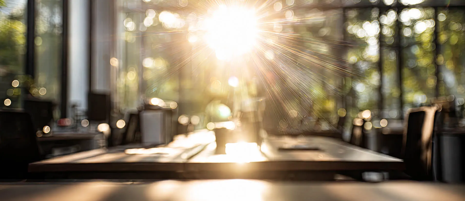 Sunlight through the windows of an office meeting space