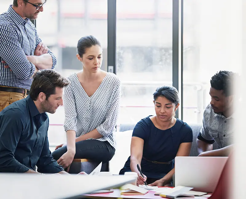 CLEAR's HR team reviewing a client's benefits and compliance plan